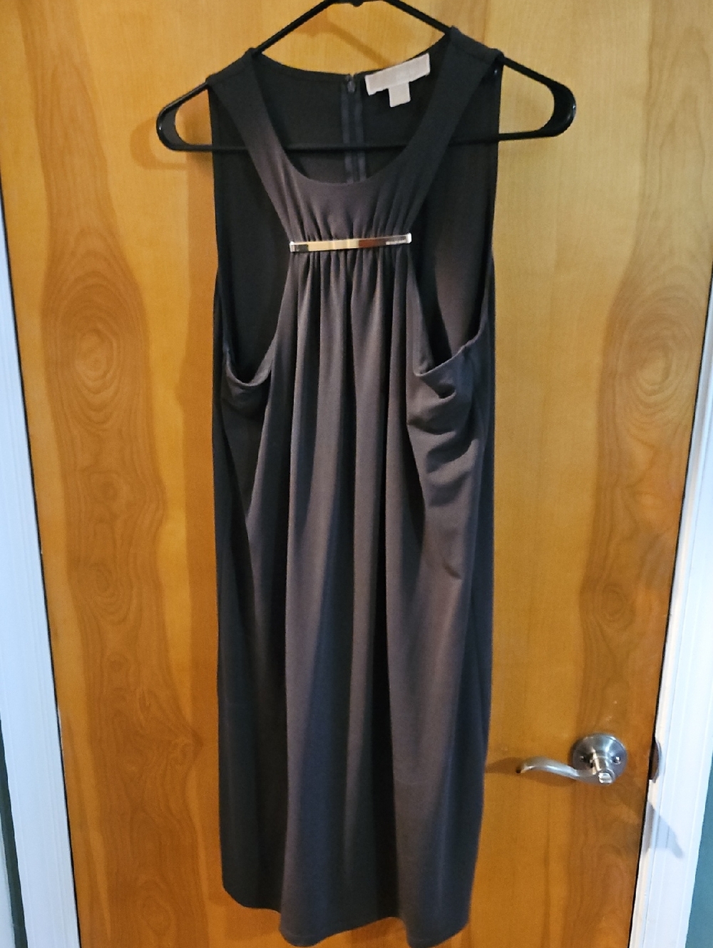 Sleeveless Black Pleated Bar-Detail Dress